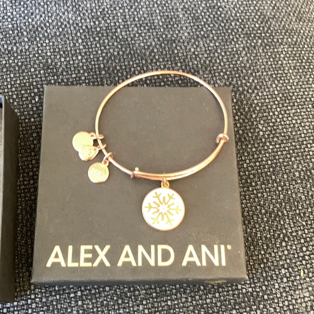 Alex and Ani rose colored snowflake bracelet